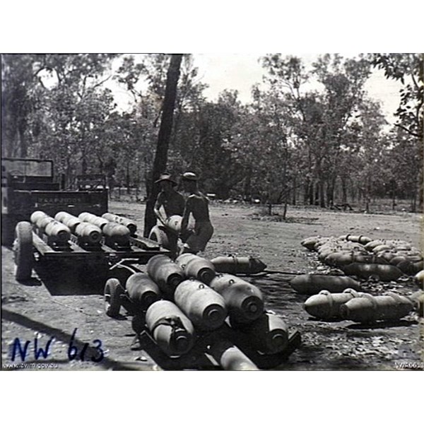 Manbulloo, NT. September 1944. Ground staff loading bombs