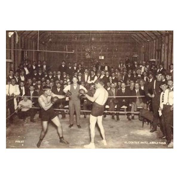 Jimmy Sharman Snr refereeing a boxing match in 1910