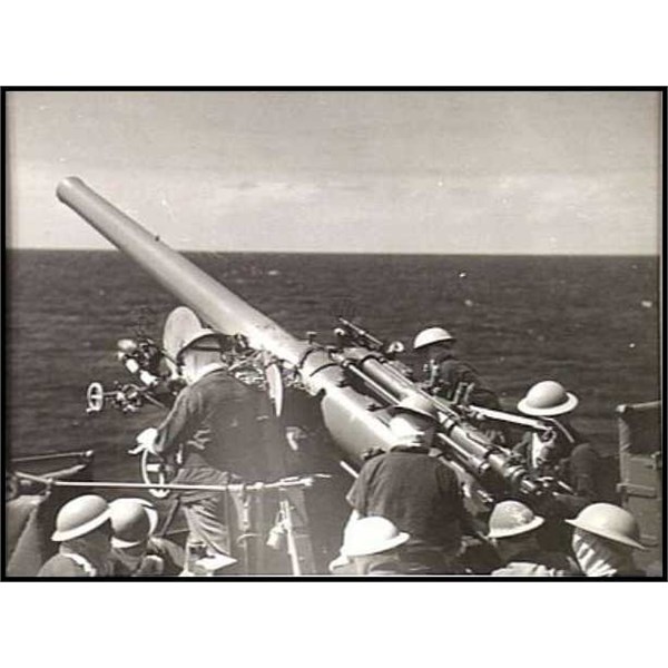 Sailors preparing to fire one of Sydney's 4-inch (100 mm) guns during a drill in February 1941