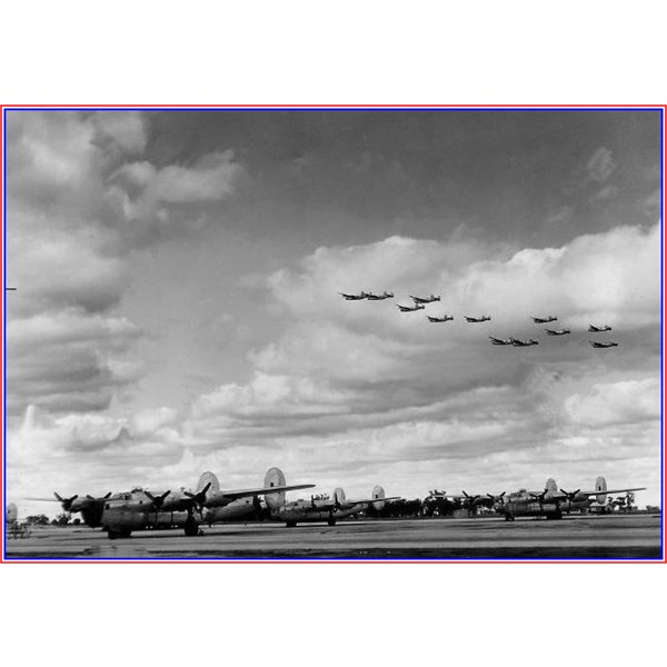 Formation of B-24 Liberators doing a flypast at Tocumwal
