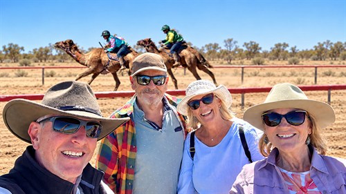 Michelle and David from ExplorOz with two ExplorOz Members at the Winton Camel Races in Queensland.
