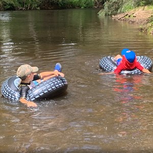 Kids Floating In River