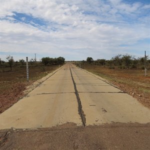 Road flood level gauge on left