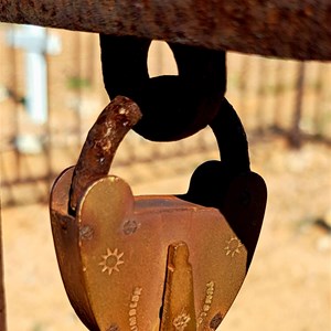 Lock on a grave fence site 