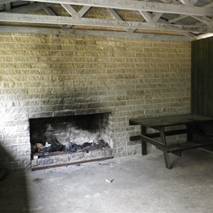 One of two fireplaces in the shelter