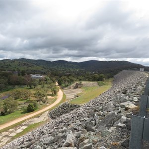 North along downstream face of dam wall