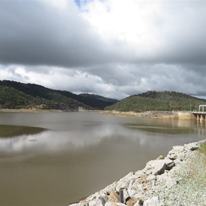 Borrow areas left and centre, spillway on right