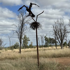 Eagle with snake sculpture