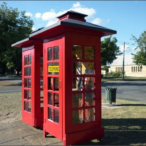 20th Century telephone boxes with working modern phones inside them.