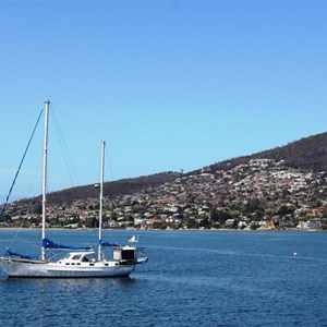 A yacht at anchor off Sandy Bay