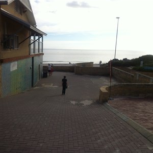 Walkway next to surf club towards beach 