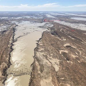 Arrow at waterhole, cross is Mekatoo Hill