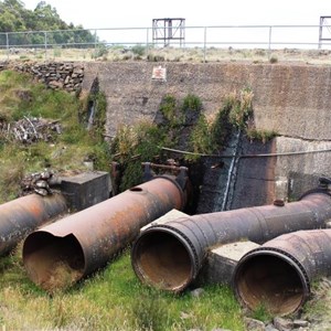 Discharge pipes and the retaining wall