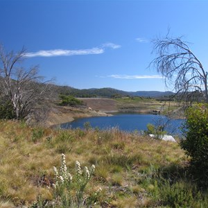 Rockfill on upstream face of dam