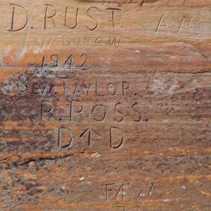 Engravings in cliff walls at Godfrey Tank