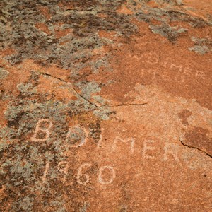 Inscriptions adjacent to rockhole